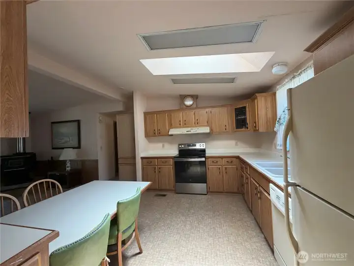 Kitchen with eating room. Kitchen with eating room.