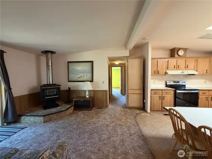 Living room with kitchen to the right. Living room with kitchen to the right.