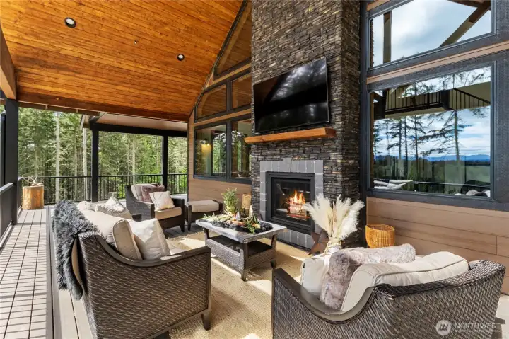 Mt. Rainier Facing Covered Porch complete with Fireplace & Entertainment Features Mt. Rainier Facing Covered Porch complete with Fireplace & Entertainment Features
