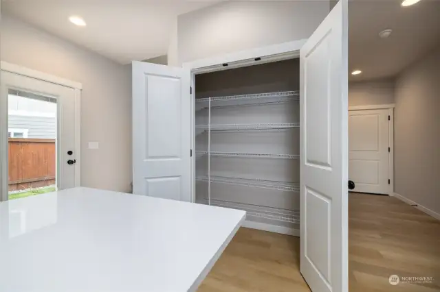 Pantry closet in kitchen.