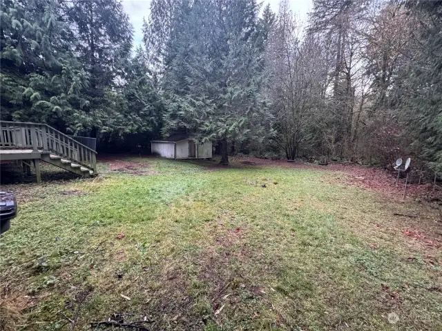 Back yard view with shop building