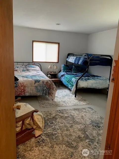 Bunkroom in the back of the garage could be used many different ways.