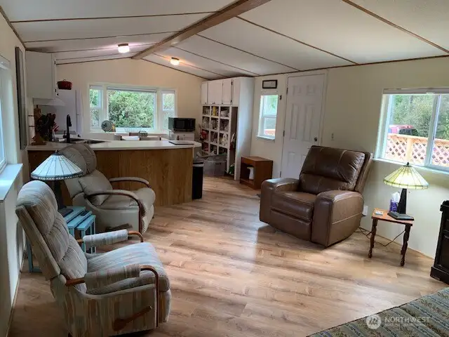 The open concept to the kitchen creates a comfortable feeling in the room.