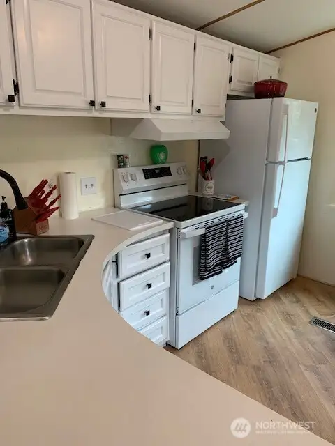 Brand new refrigerator and stove.