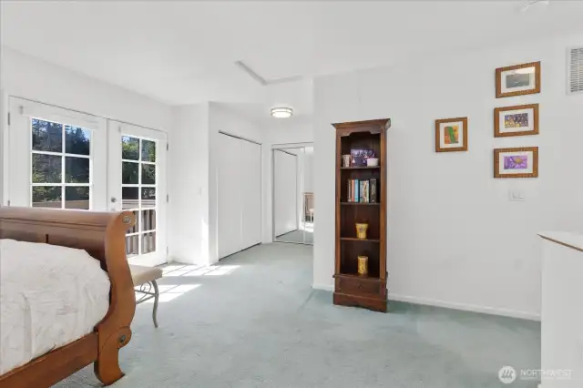 Primary bedroom has lots of closet spaces w/private deck