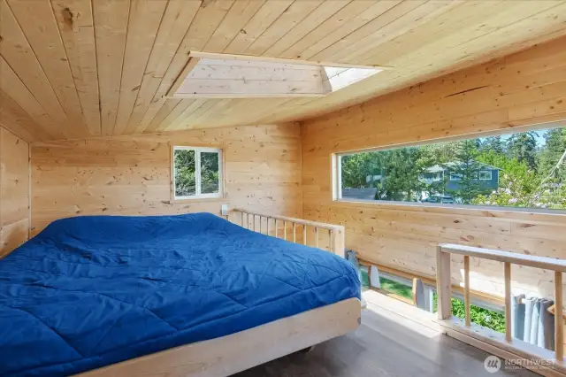 Upper loft of guest cabin has incredible views