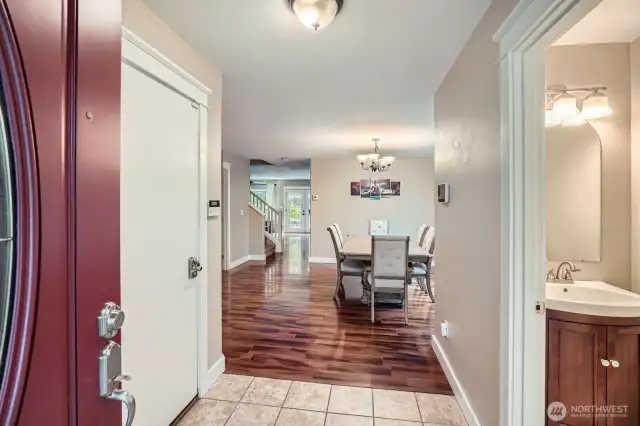 Entering the home the bathroom to the dining area