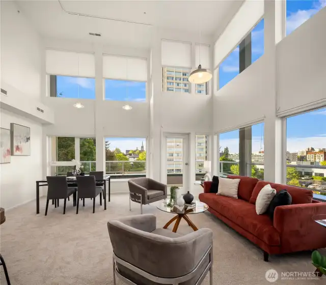 A rare 2 story penthouse unit in the University District. This home is nearly 2,000 square feet (1,998), with 4 bedrooms, 3 full baths, 2 assigned parking spaces, and high ceilings.
