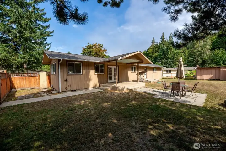 Step outside to a spacious, fully fenced backyard offering both relaxation and functionality.