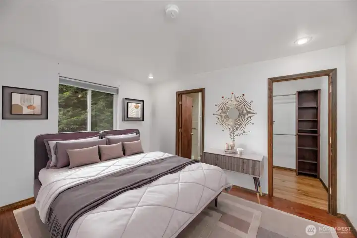 Virtually Staged: a primary bedroom loaded with confort and style, the options open up possibility.