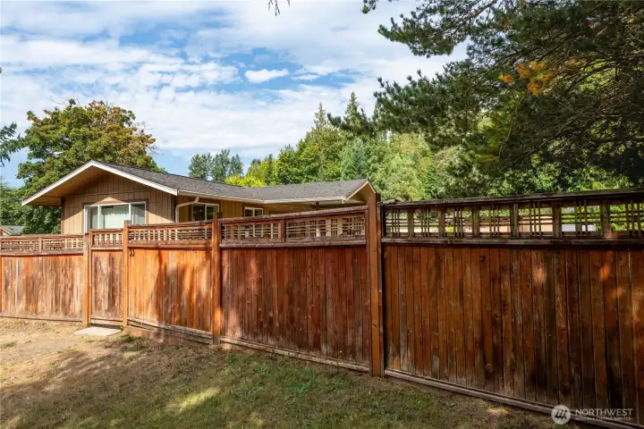 The fenced yard enhances privacy and makes this property ideal for pets, play, or gardening, all while enjoying the peaceful surroundings of the neighborhood.