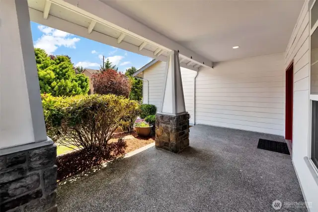 Porch swing, patio chairs and table, holiday decorations or just a clean space to sit and relax out of the sun. Porch faces East.