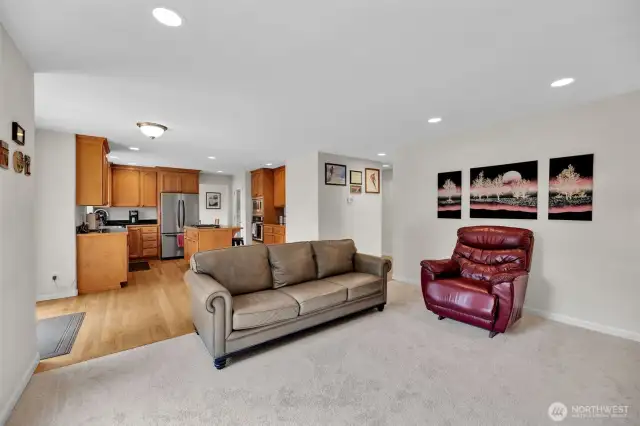 Great room ties the kitchen and family rooms together with access to the rear deck.