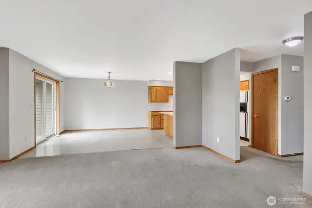 Spacious dining room with slider to outdoor patio.
