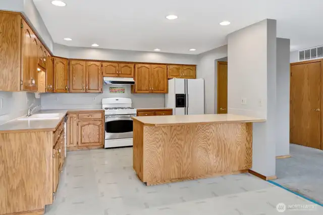 The kitchen is huge & offers great lighting.