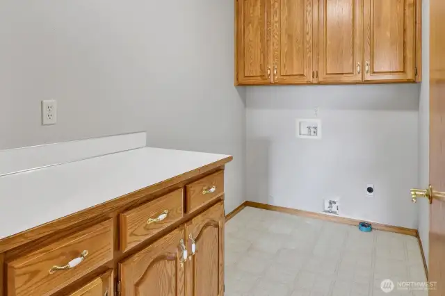 Laundry room with countertop & uppers! Electric & gas hookups!