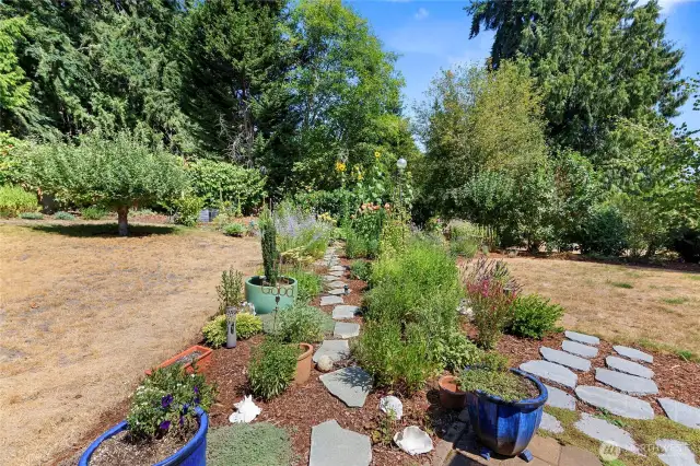 Step off the patio into a beautiful herb and vegetable garden
