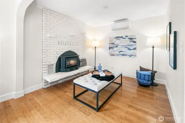 Inviting living room centered around a cozy gas fireplace—perfect for relaxing or entertaining.