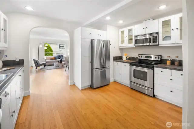 Generous kitchen featuring extensive cabinetry—perfect for cooking, entertaining, and staying organized.