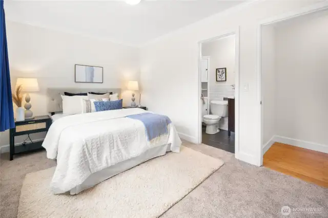 The spacious primary bedroom features an en-suite bath, providing privacy and everyday ease.
