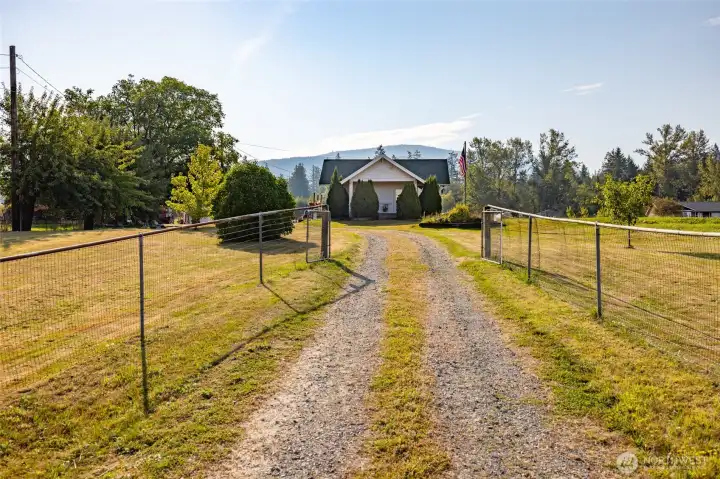 Long private and gated driveway.
