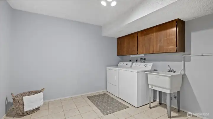 Extra-large utility room. You could easily add cabinets and a folding table.