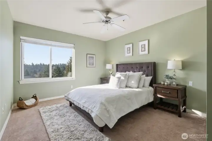 Primary suite retreat with calming colors and natural light