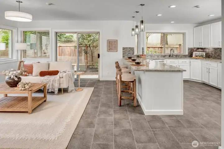 Updated beautifully....one room flows nicely into the next. Private patio w/nature surround....everything about this home is ideal.