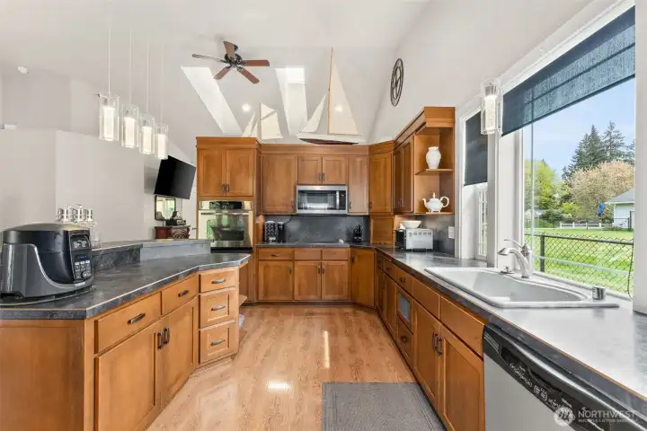 Gourmet Kitchen with stainless appliances that all stay.