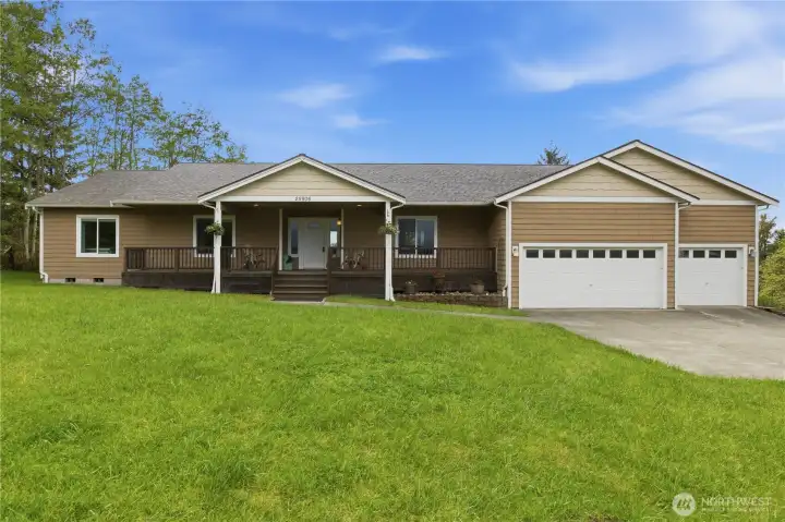 Enjoy sweeping, unobstructed views from this well-kept rambler, lovingly maintained by its original owner. Nestled on nearly 5 acres, this property offers privacy, open space, and the peaceful rural setting Ravensdale is known for.  Perfect for anyone looking for elbow room, natural beauty, and single-level living.