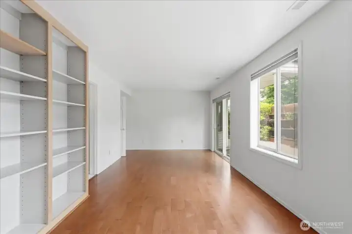 Spacious family room or potential for main level bedroom as there is access to a full bathroom.