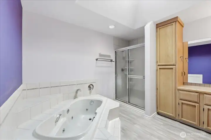 Primary bath with jetted tub, separate shower and double sinks.