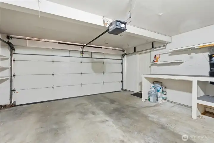 Roomy 2 car garage with opener.