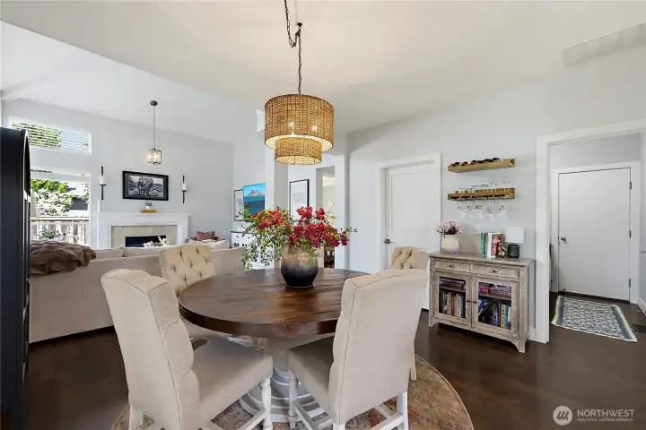 The table space is anchored by this perfect chandelier