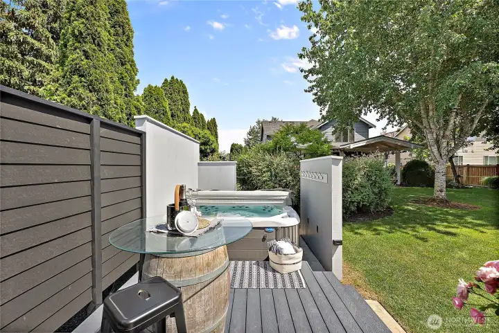 AND there's a hot tub, complete with privacy walls