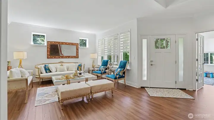 Tall ceilings and this inviting formal living space,