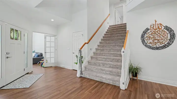 Double wide stairs to the upstairs of the home.