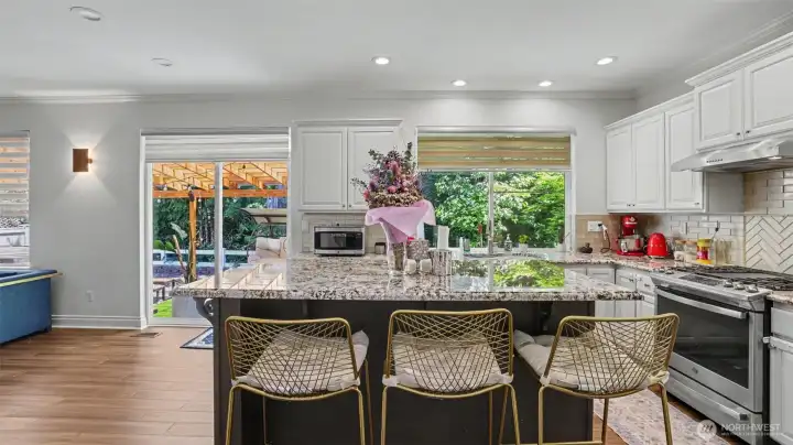 Gas cooktop, and ample workspace, flowing seamlessly into the main living areas.