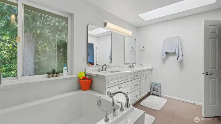 Primary bathroom with new floors.