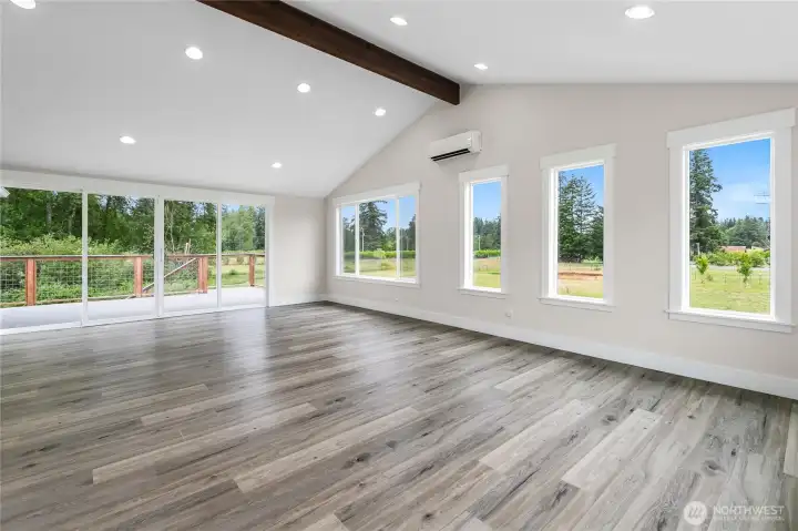 Huge French door sliders lead to the spacious deck!