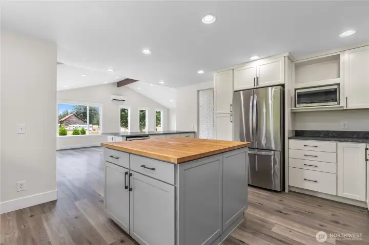 Working island in the kitchen for additional space.