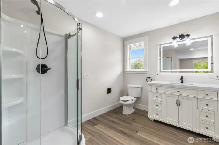 Fully updated ensuite with walk-in shower and backlit mirror.