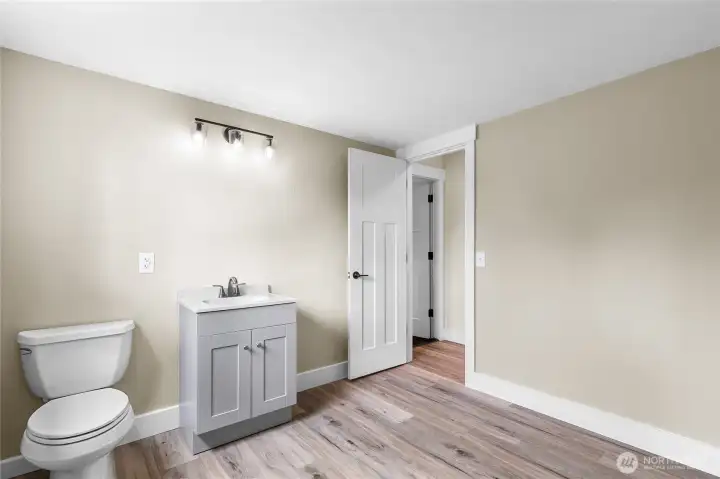 1/2 bath in off of the bonus room on the ground floor