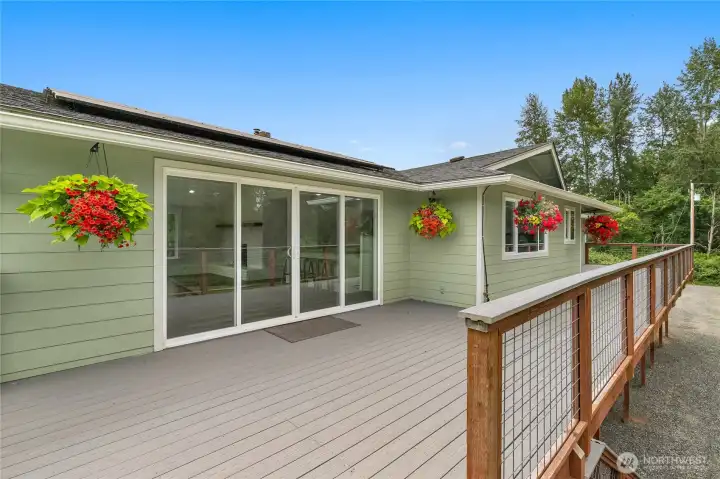Look at this spacious deck with easy access off of the kitchen/living and the primary