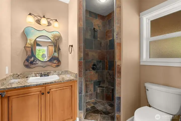 Main floor 3/4 Bath adjacent to the mud room
