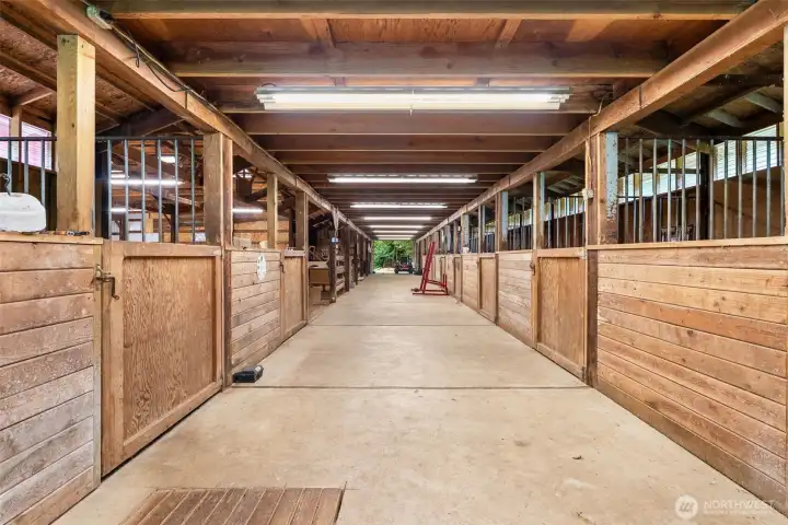 The Barn features features 9 stalls, a tack room, shop, storage rooms and a loft. Total sq footage approx 6,448 includes riding arena sq footage