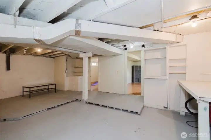 Basement has lots of storage and cool shelves Basement has lots of storage and cool shelves