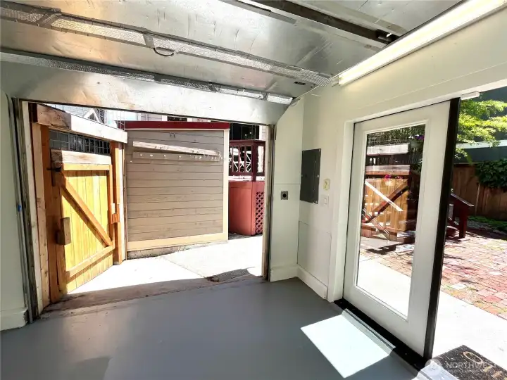 Front of studio space with French Doors and dedicated electrical panel. Front of studio space with French Doors and dedicated electrical panel.