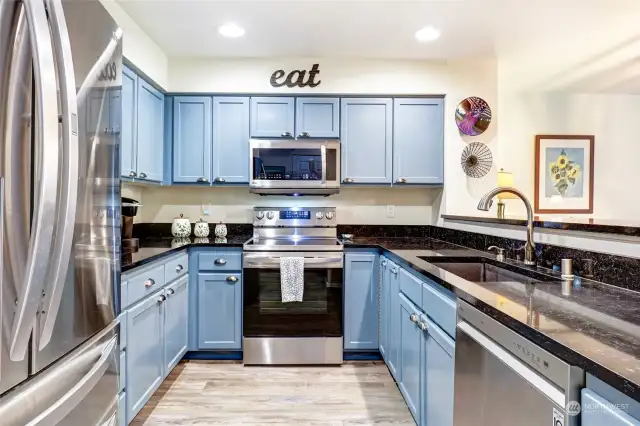 Updated kitchen with Stainless LG appliances and plenty of cabinets for the aspiring chef.
