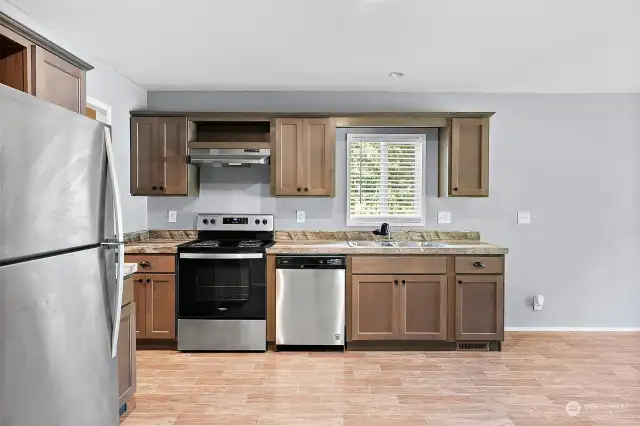 Kitchen with stainless steel appliances.